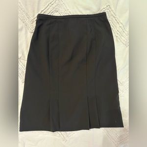 Ann Taylor Black Pencil Skirt Size 6P
w/2 Pleated Vents